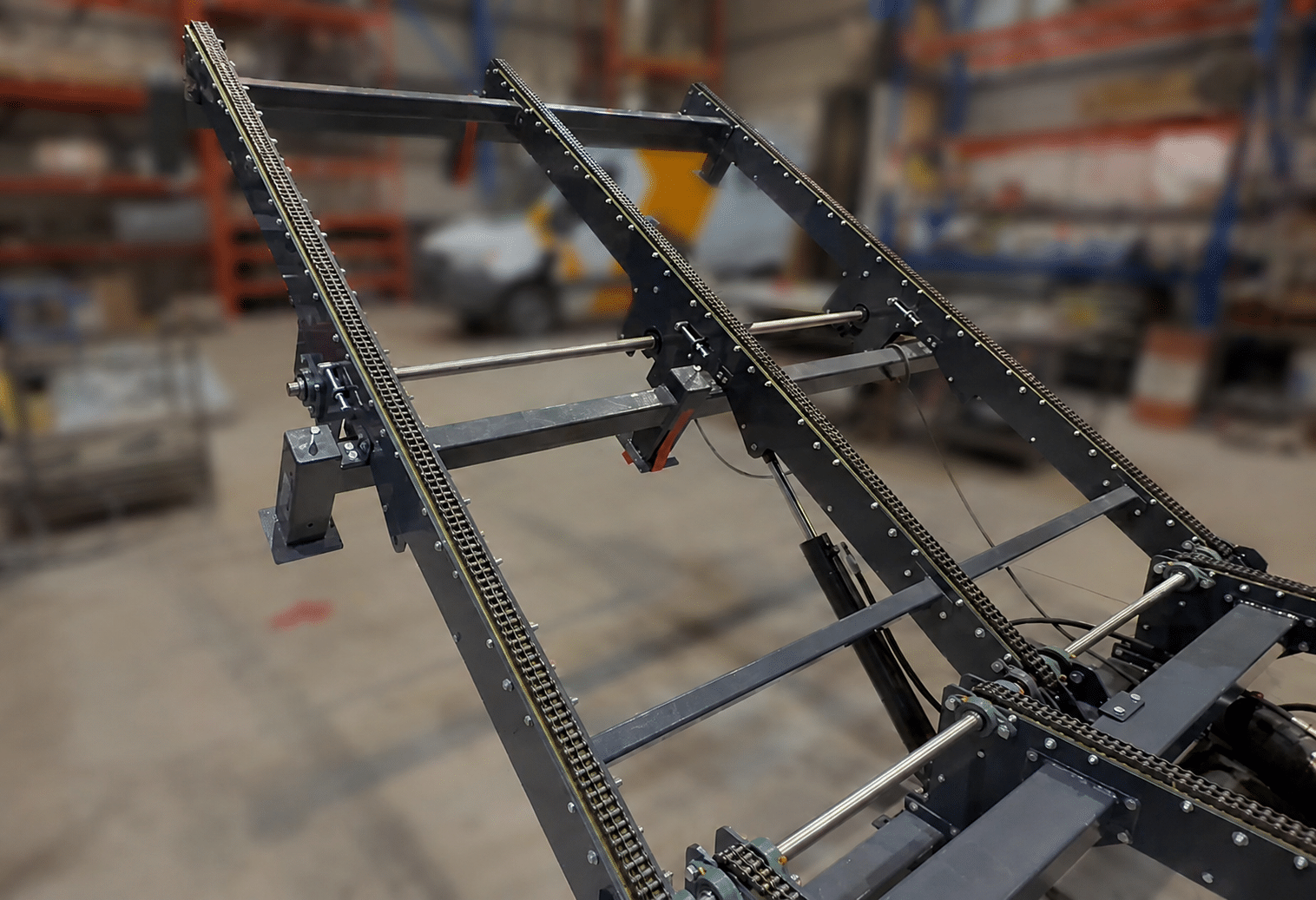 Conveyor with chain bridge elevator